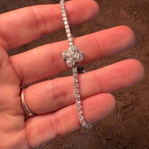 Elegant Silver Bracelet with Floral Accent